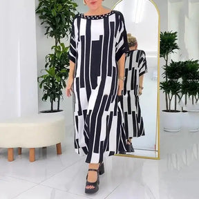 Vestido Palazzo™ Com Detalhe em Pedras e Caimento Estilo Túnica