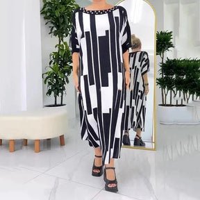 Vestido Palazzo™ Com Detalhe em Pedras e Caimento Estilo Túnica